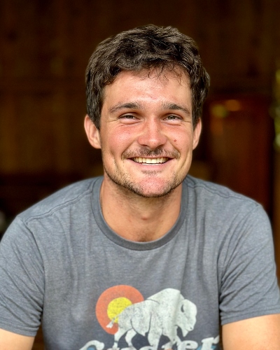 Man smiling with a short sleeved shirt